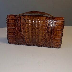 Vintage unisex genuine hornback crocodile skin clutch.